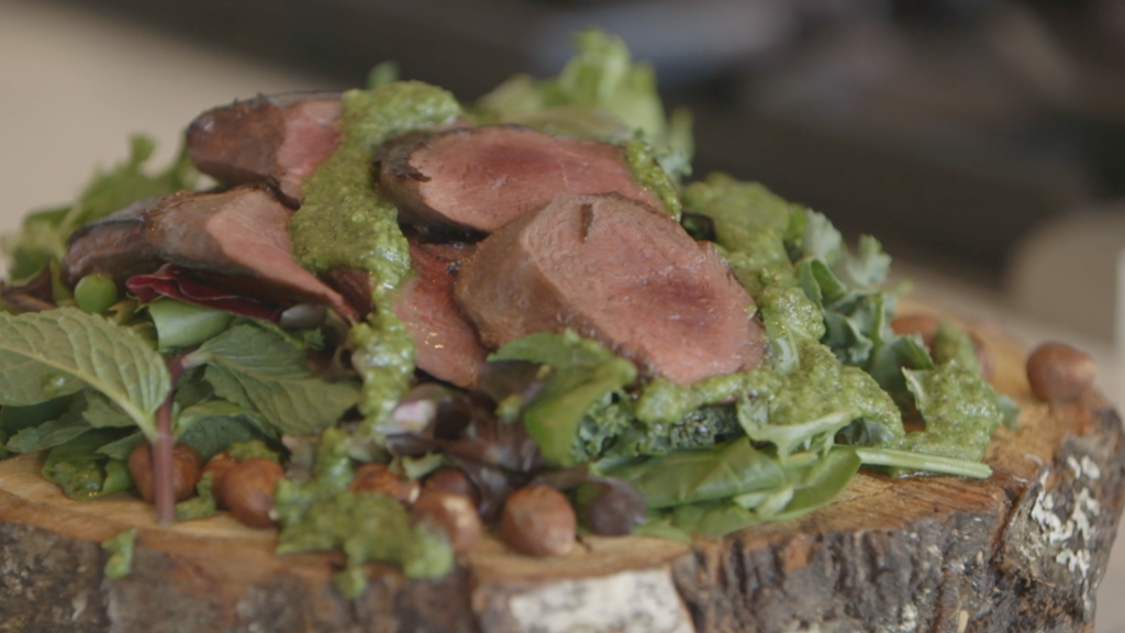 Pan Roasted Wild Pigeon With Foraged Greens And Hazelnut Pesto